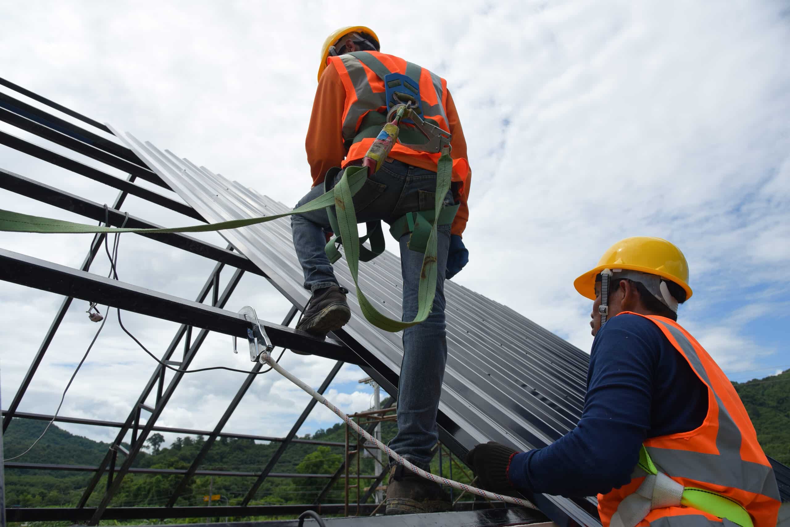 Installing metal roofing panels in Dodge City KS scaled