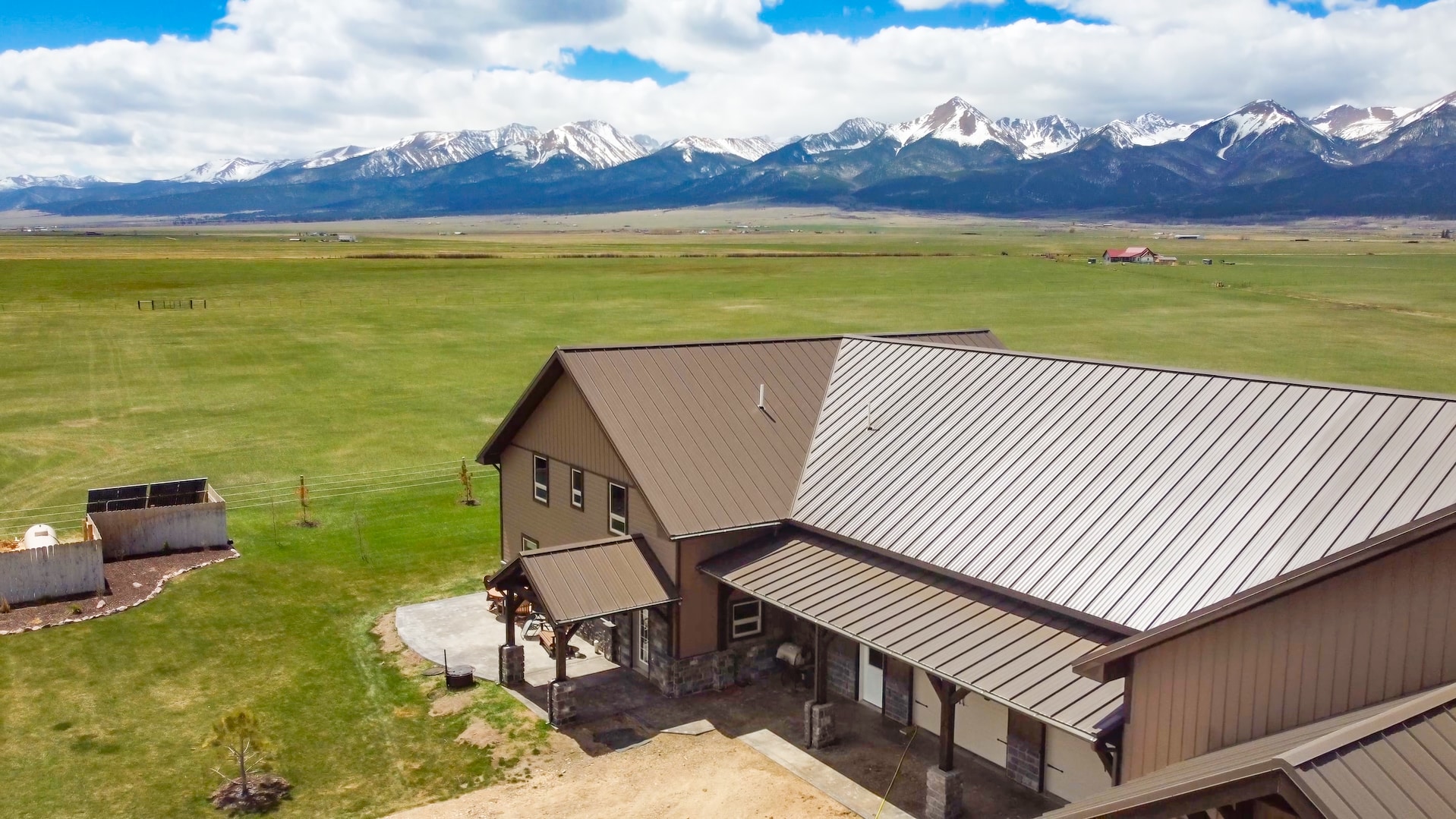 Metal panel siding and roofing on a large house in Glen Rock WY