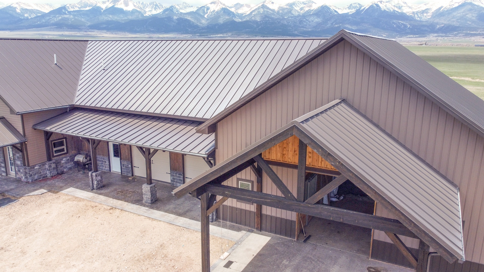 Metal roofing and siding on a building from a metal siding supplier in Canon City CO